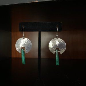One of a kind silver and jade earrings.
